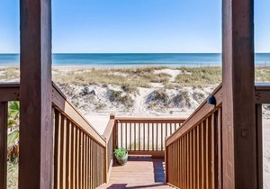 Updated Home with Covered Porch to Enjoy the Ocean Breezes and Sound of the Waves!