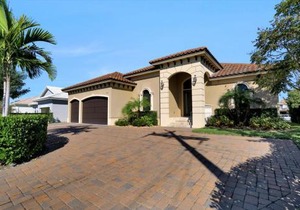 Waterfront home with pool, spa and outdoor kitchen