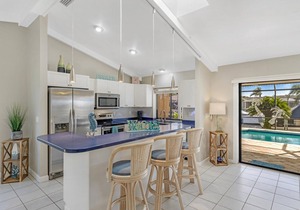 Waterfront Pet Friendly Villa, Heated Pool & Pool Table- Villa Nautical Breeze - Roelens Vacations