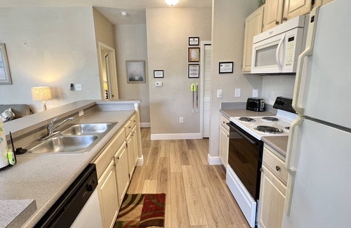West Kissimmee Condo | 1-101 Legacy Dunes, Just Steps to the Beach Style Pool, Minutes to Disney!