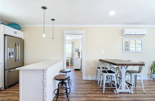 Mid Island House | 244 Dundee - Dog Friendly Island Cottage on Canal, Short Walk to the Beach!