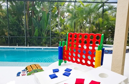 Ocean Woods House | 6 BD w Heated Screened-in Pool & Jacuzzi-No Bugs, Theater, Arcade, Walk to Beach