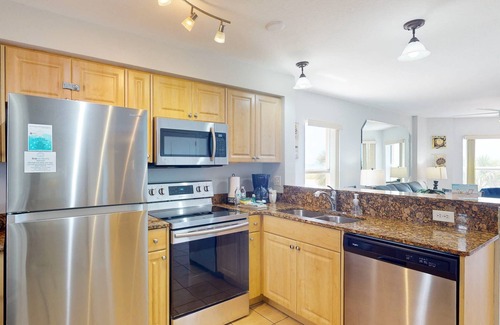Treasure Island Condo | Beachfront Condo. Heated Pool. Activities, Fun, End Unit, Parking, & Great Location!