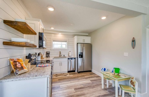 Butler Beach Apartment | BEACHFRONT NEW Heated POOL, Oceanfront Porch and View from Entire Living Space! Private Beach Access