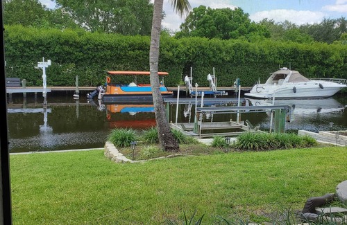 Lochmoor Waterway Estates House | Bring your boat to tie up to the new dock with easy access to the Caloosahatchee