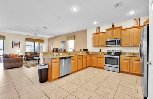Davenport House | Championsgate Resort 8 Bedroom Pool Home w Theater Room