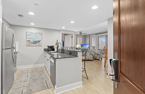 Baytowne Wharf Condo | Charming 2BR at Wharf! Beach, Tropical Pool + Hot Tub, Tram, Spacious Balcony