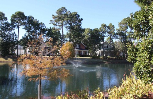 Laurel Grove House | Charming Cottage! 2 Golf Carts, Near the Pool & Hot Tub, Beach Tram Included!