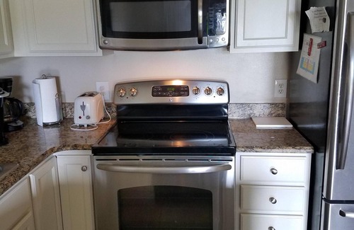 Crystal Beach Condo | Direct Gulf View, Designer Decor! Steps to sand. Sleeps 6.