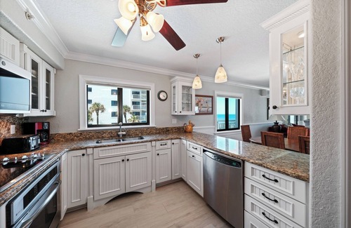 New Smyrna Beach Condo | Direct oceanfront corner condo with a large wrap around balcony and heated pool