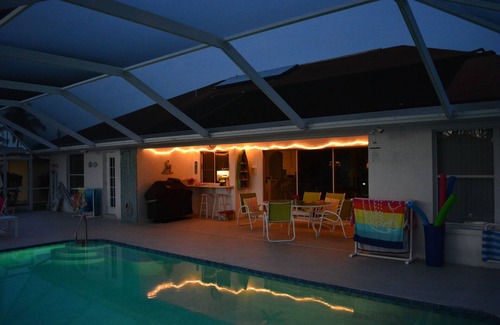 Pelican House | Excellent furnished vacation home on waterfront with boat dock and lovely yard