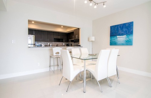 Sunny Isles Beach Condo | Modern condo w/bay views. WiFi, parking, tennis, playground and more!
