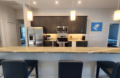Trafalgar House | New Home - Best in City 4-bedroom house, heated pool on Lake Jolie