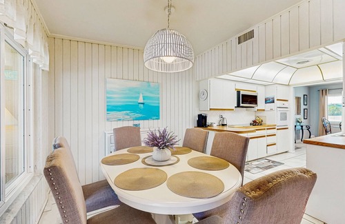 Englewood South House | Outdoor paradise on waterway with pool and spa, beach gear, and dog friendly