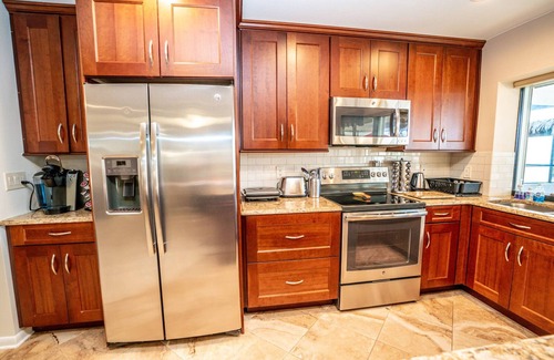 Apollo Beach House | Paradise Waterfront Resort! Pool &Spa with swim-up bar, Dock Kayaks, Pet Welcome