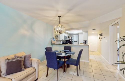 Bonita Bay Condo | Second-floor condo with central AC, private W/D, and private shuttle