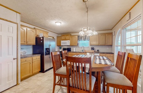 Delta House | Serene Lakeside Home with lake access access and fire pit