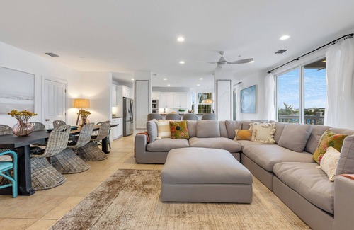 Meadows House | SEVENTH HEAVEN~Waterfront 5 BR, 4 Ba Townhome with Pool, Elevator & Dockage!