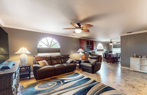 Mid Island House | Spacious home with heated pool, lots of outdoor entertainment, and WIFI