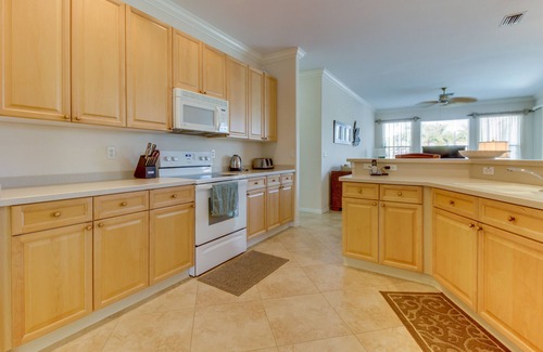 Biggar House | Spacious home with screened-in pool & lush lakefront views - minutes to beaches
