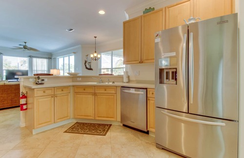 Biggar House | Spacious home with screened-in pool & lush lakefront views - minutes to beaches