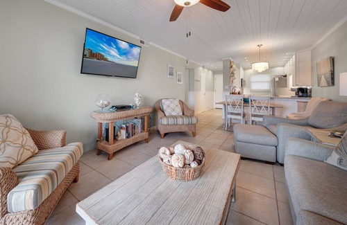 Brown Condo | Top-floor condo with ocean and pool views, private balcony, and multiple beachfront pools