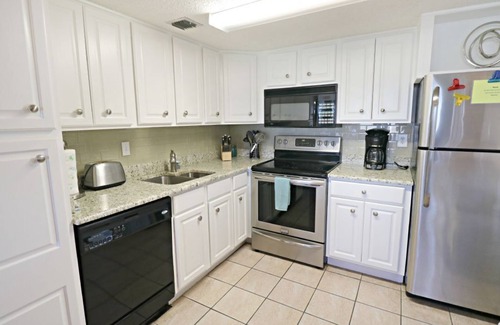 Crescent Beach Apartment | Updated, Ground Floor, STEPS from the Beach, Pool, Boat Ramp and Fishing Pier on