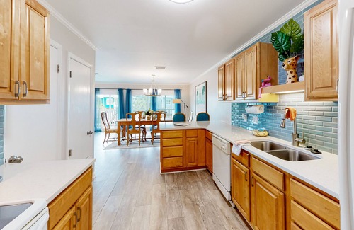 Perdido Key Coves One House | Waterfront townhome with tennis courts, boat dock, & washer/dryer