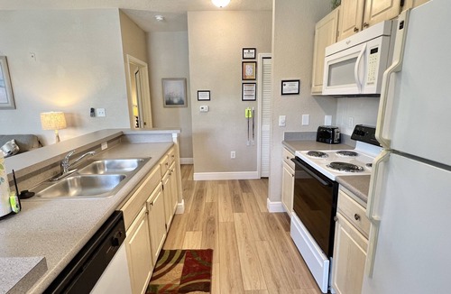 West Kissimmee Condo | 1-101 Legacy Dunes, Just Steps to the Beach Style Pool, Minutes to Disney!