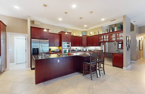 Bay Crest Park House | 2 657 sq ft upscale canal home with pool dock and stunning main suite dog friendly