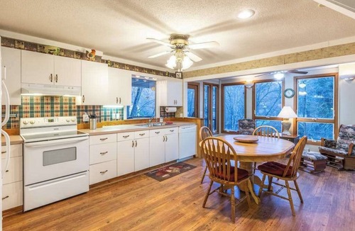 Otto House | 2-story waterfront home with mountain & creek views, decks, grill, fireplace, AC