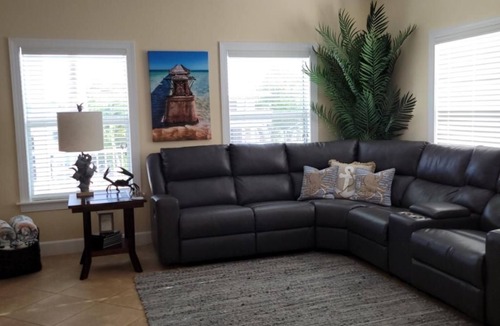 Breezeswept Beach Estates House | 3/2 two story home with pool and 80' dock on canal ocean side.