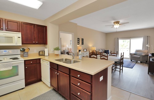 Waterside Village Condo | 3BR Condo on Canal, Walk from Beach with Community Pool ~ Waterside 203