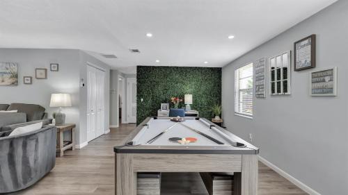Dunedin House | 3BR Oasis Sleeps 10 Heated Pool Ping Pong!