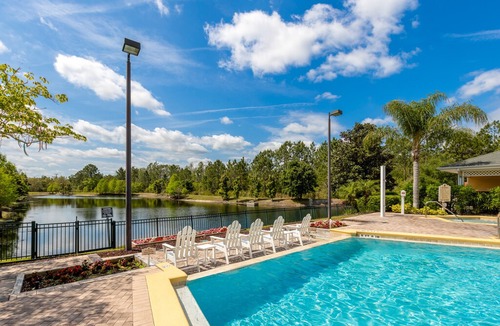 West Kissimmee Condo | 3rd floor condo w/ sauna, shared pools, balcony, gym, hot tub, near theme parks