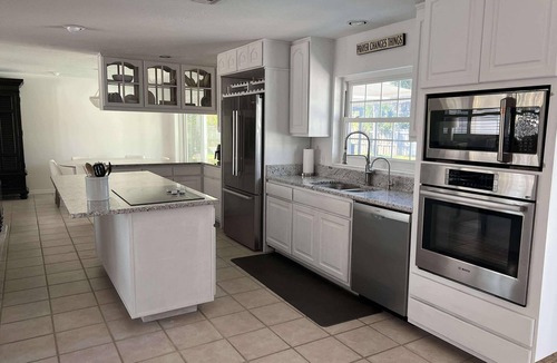 Melbourne Beach House | 4/3 Home on A1A with private beach access WiFi, fitness room & heated pool