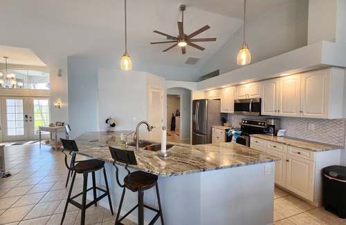 Burnt Store House | 4-bedroom Gulf access, heated pool, lanai, dock