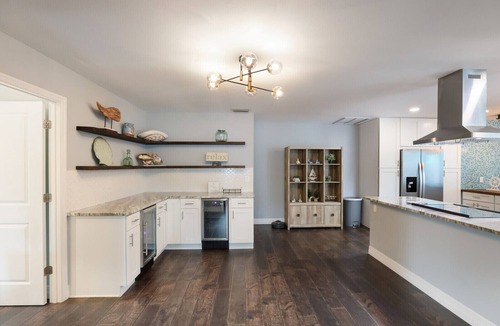 West Bradenton House | 4BR Saltwater Pool Oasis, Game Room, Outdoor Spa, & Tropical Garden Retreat
