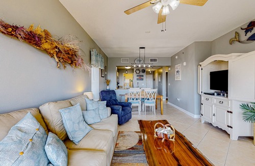 Waterside Village Condo | 4th-floor canal view condo with balcony, pool/hot tub access, washer/dryer & AC