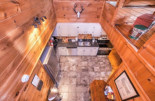 Epworth Cabin | 6BR Log Cabin Anglers Retreat w/Fire Pit Hot Tub & Game Room | Pet Friendly