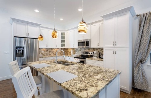 Naples Park House | 833 Naples Oasis: 4BR, Heated Pool, Steps to Beach!