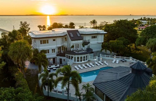 Fort Pierce Villa | 9K SF Waterfront Mansion, Pool, Boat Dock, Theater
