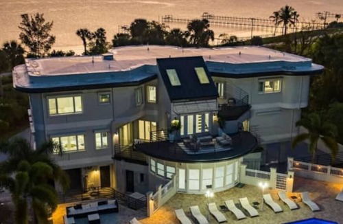 Fort Pierce Villa | 9K SF Waterfront Mansion, Pool, Boat Dock, Theater