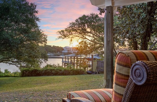 Wilmington House | A charming 4-bedroom waterfront with a private dock retreat that offers a secluded serene getaway!
