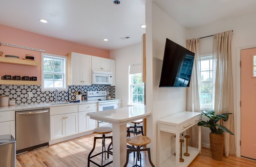 Downtown House | A cozy home and garden cottage situated across from million dollar homes.
