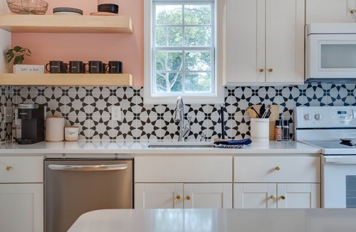 Downtown House | A cozy home and garden cottage situated across from million dollar homes.
