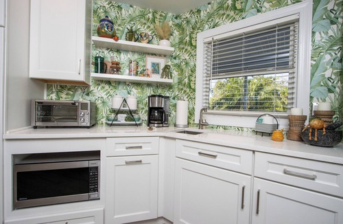 Iona House | A Splash Of Water - Family-Friendly Retreat with Private Heated Pool and Lakefront View