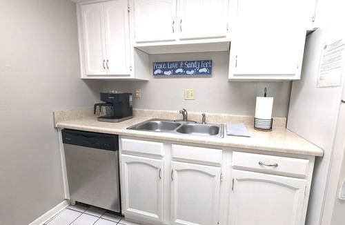Avon By The Sea Condo | Affordable ONE BR Main Floor Condo RIGHT ON THE BEACH w/KING Bed & Heated POOL!