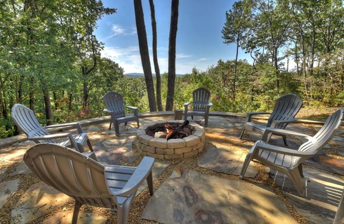 Talking Rock Cabin | Amber Sunsets dazzles with panoramic views, hot tub luxury, a custom firepit, screened porch, pool table, and pet-friendly hospitality!