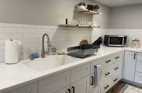 Greensboro Apartment | Axes & Roses: King Bed Forest Hideaway with Kitchen. Quiet retreat.